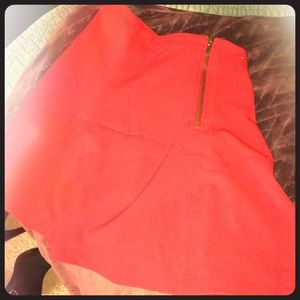 Red mini skirt with back zipper.